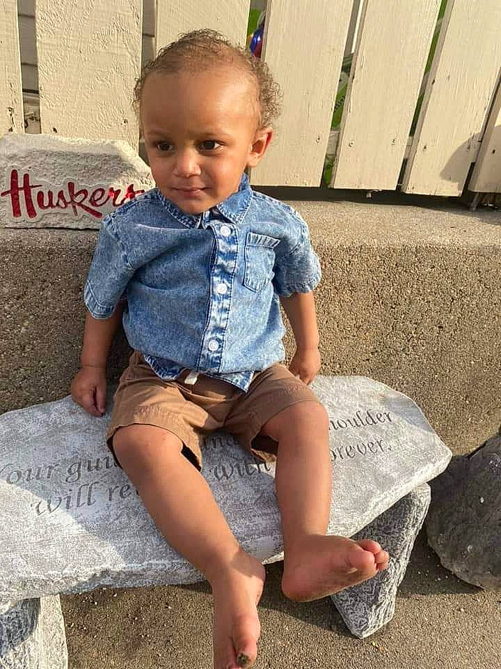 Malik joined the competition — help win amazing prizes! baby_toddler_clothing, denim, electric_blue, hairstyle, happy, human_leg, joint, knee, leg, leisure, pattern, person, shorts, shoulder, sitting, sleeve, summer, t_shirt, thigh, toddler