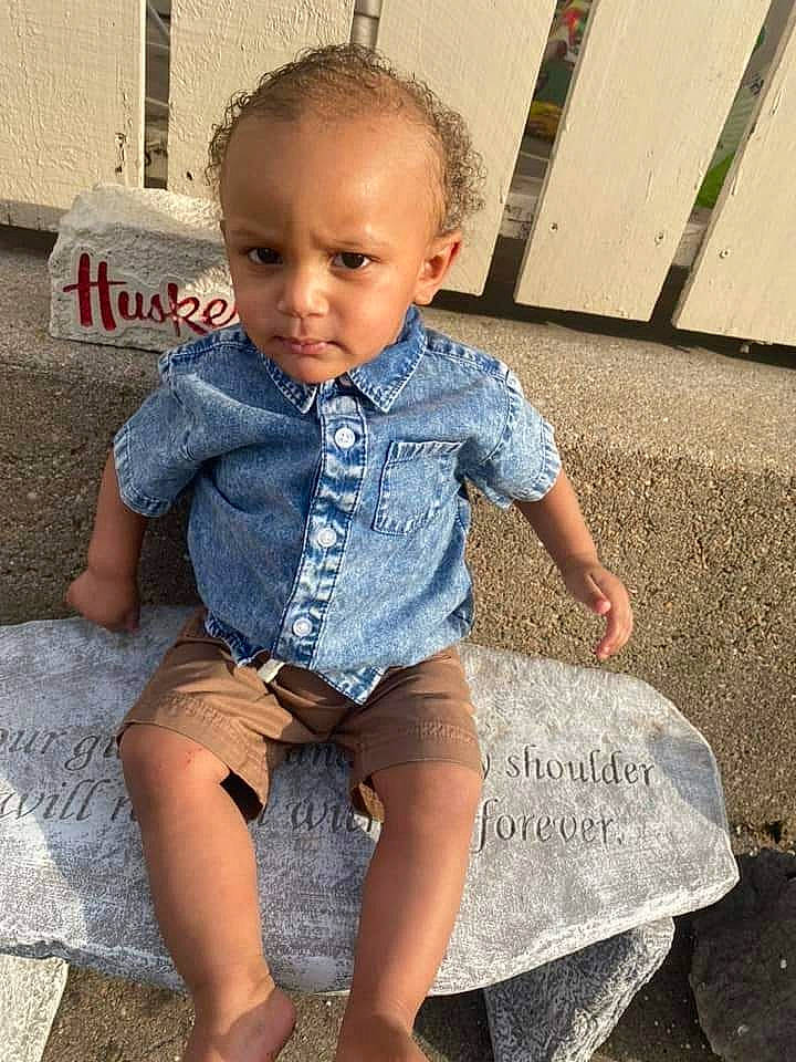 Malik joined the competition — help win amazing prizes! baby_toddler_clothing, cool, denim, electric_blue, grass, happy, head, human_body, human_leg, leg, leisure, person, shorts, shoulder, sitting, skin, sleeve, t_shirt, thigh, toddler