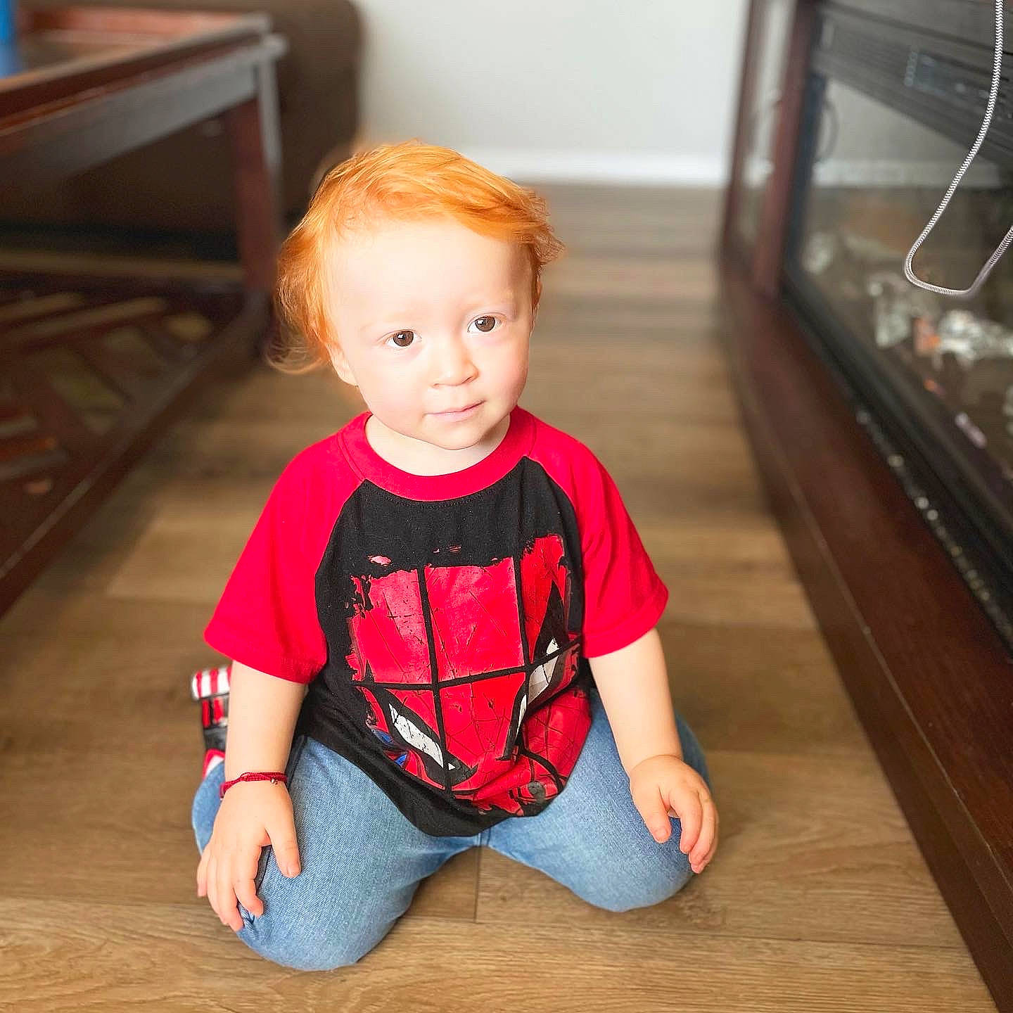 Jadiel joined the competition — help win amazing prizes! baby_toddler_clothing, cheek, chin, clothing, comfort, face, floor, flooring, hardwood, head, jeans, joint, neck, person, shoulder, skin, sleeve, standing, t_shirt, toddler