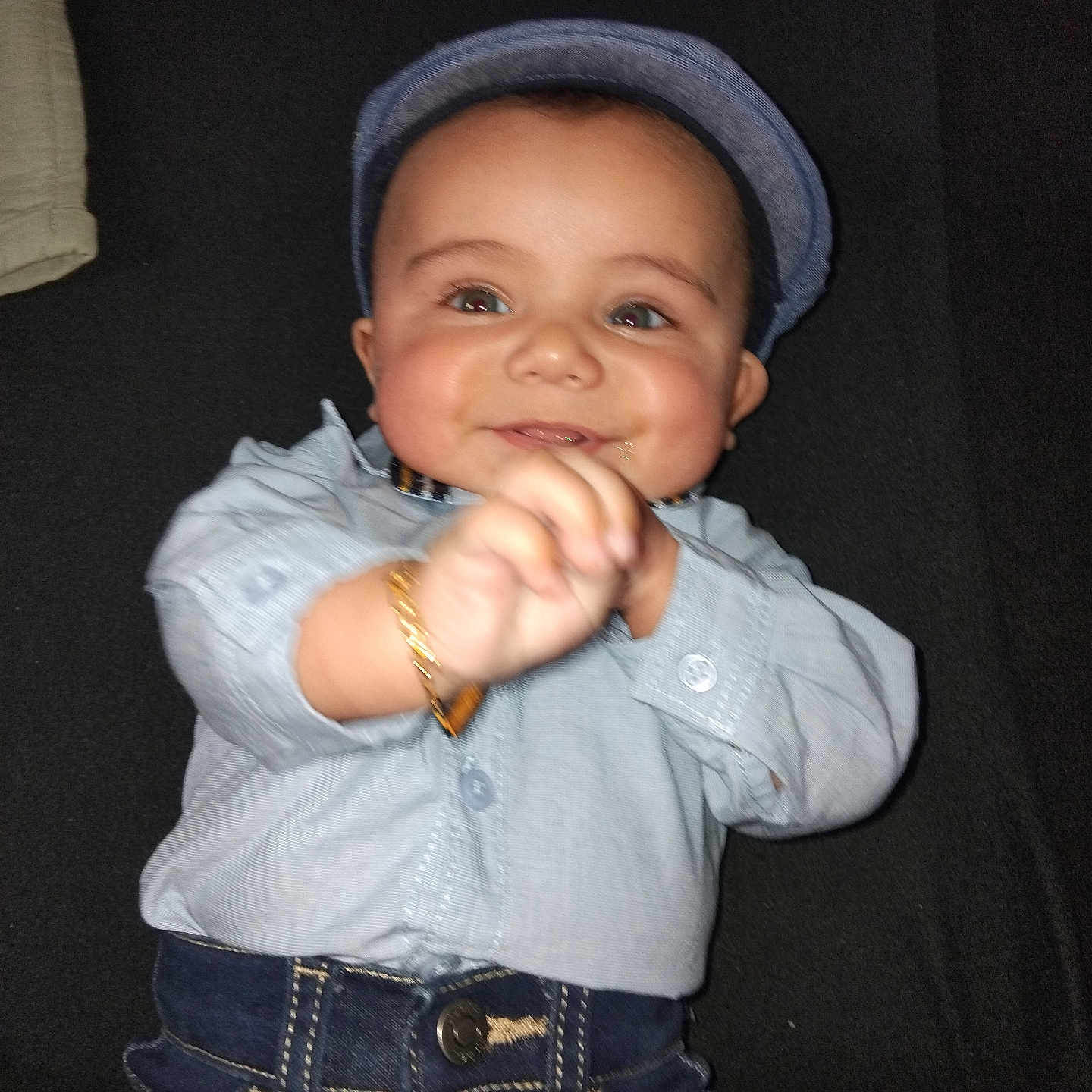 Vicktor participe au concours pour gagner de l'argent avec cette photo : baby, bracelet, cap, casual, child, clothing, cute, denim, face, fashion, hand, happy, indoor, infant, jeans, person, portrait, seated, shirt, smiling