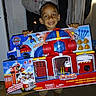 Shyden joined the competition — help win amazing prizes! child, toy, paw_patrol, fire_rescue, smile, indoor, lamp, door, packaging, playset, happy, person, boy, floor, carpet, hand, furniture, room, lighting, excitement