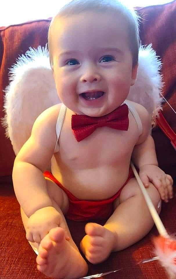 Johnny is registered to the contest to win money with this photo: arm, baby, baby_toddler_clothing, cheek, chest, face, finger, gesture, hand, happy, human_body, muscle, nose, person, product, skin, smile, thigh, thumb, toddler