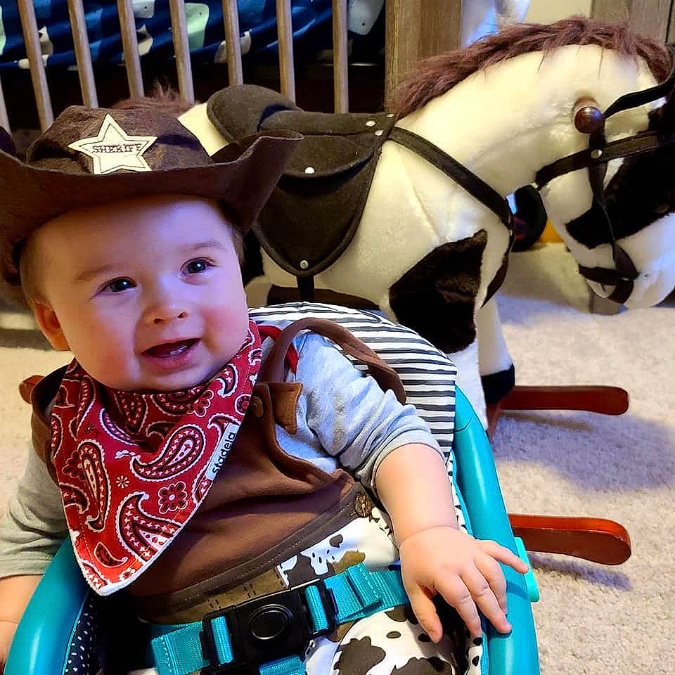 Johnny joined the competition — help win amazing prizes! baby, baby_toddler_clothing, blue, cool, costume_hat, fun, happy, hat, headgear, headwear, horse, horse_tack, light, mammal, people, person, photograph, sleeve, toddler, vertebrate