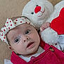 Alicia participe au concours pour gagner de l'argent avec cette photo : baby, infant, child, headband, bow, heart_pattern, stuffed_animal, teddy_bear, red_heart, blanket, close_up, portrait, big_eyes, open_mouth, pink_clothing, plush, cute, soft_texture, indoor, laying_down