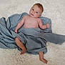 baby, infant, child, blue_cloth, blanket, bare_chest, lying_down, white_background, soft_texture, cute, portrait, skin, legs, arms, head, face, eyes, expression, indoors, calm