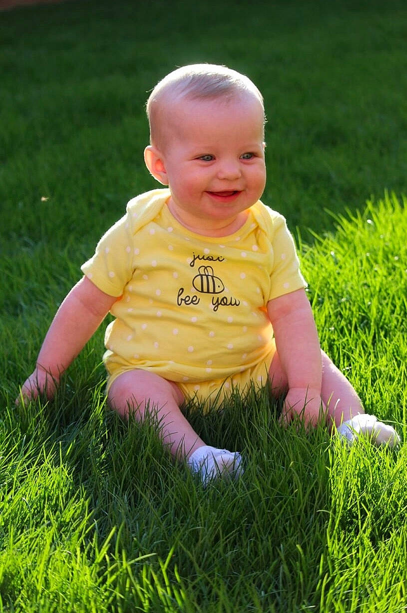 Dolcie joined the competition — help win amazing prizes! baby, child, finger, grass, grass_family, green, joy, lawn, meadow, people_in_nature, person, plant, play, sitting, skin, smile, summer, toddler, yard