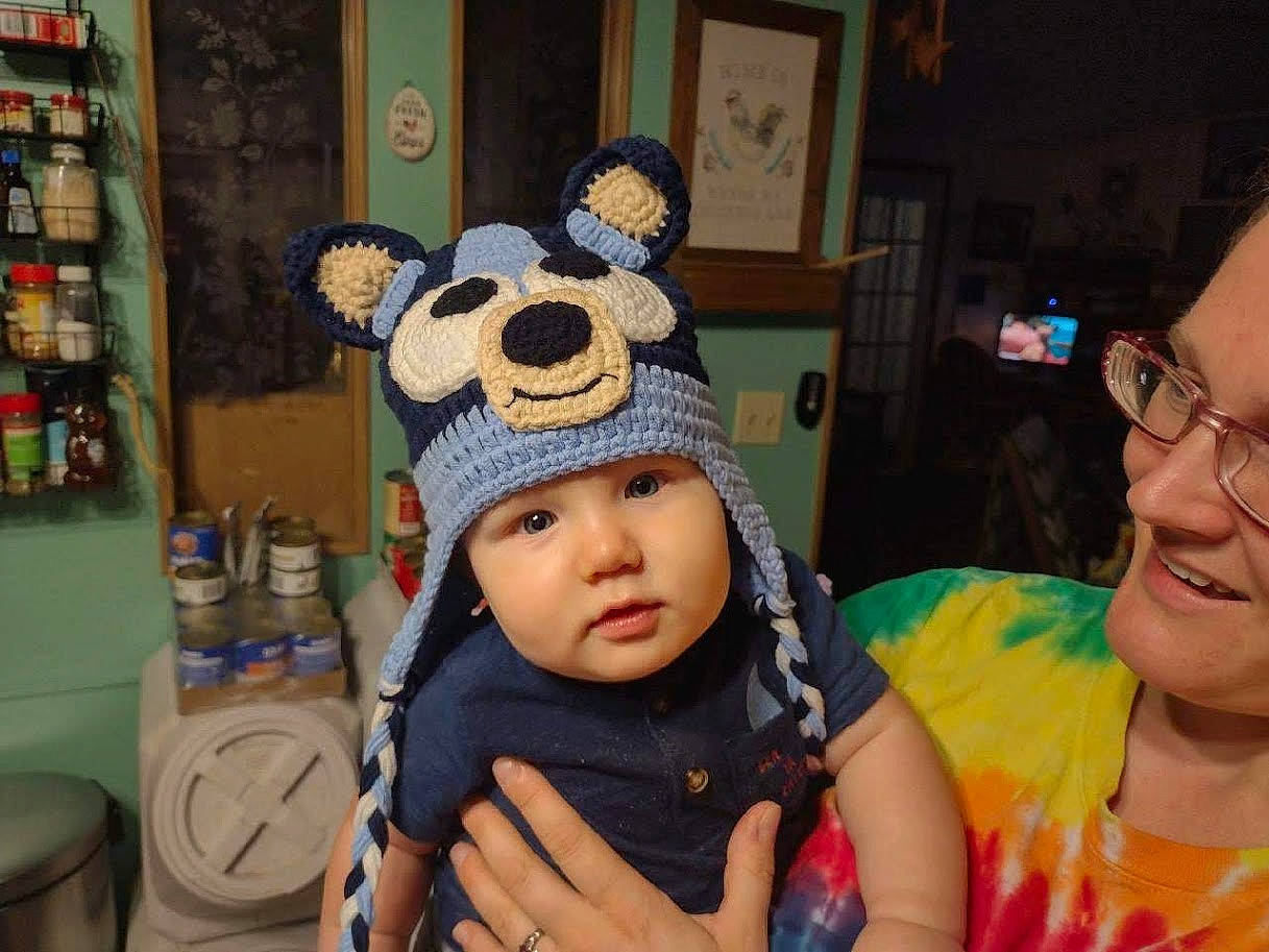 Finnley is registered to the contest to win money with this photo: baby, baby_toddler_clothing, baseball_cap, cap, child, costume_hat, event, fashion_accessory, fedora, fun, glasses, happy, hat, headgear, headwear, joy, knit_cap, person, shelf, smile