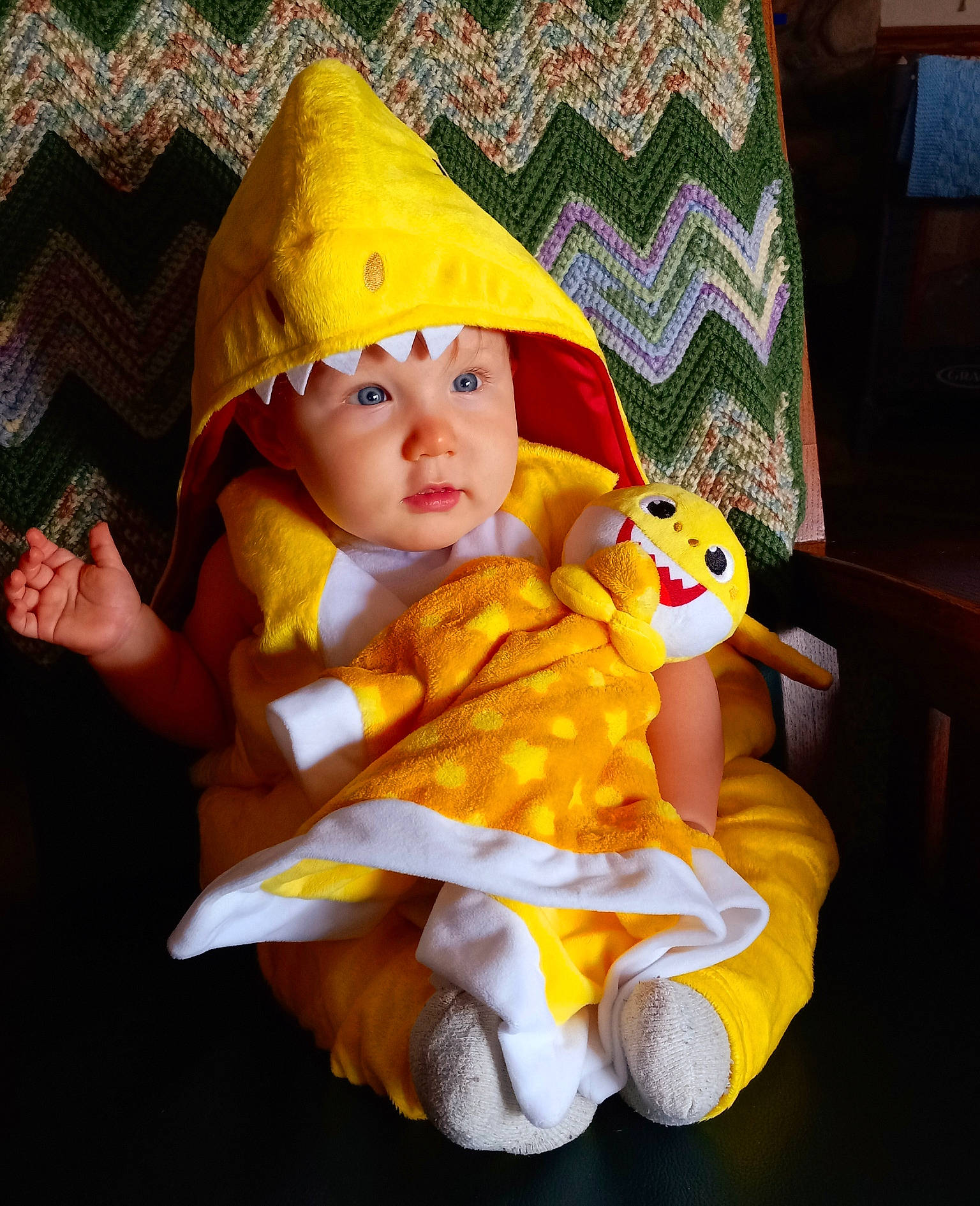Finnley is registered to the contest to win money with this photo: baby, baby_products, baby_toddler_clothing, cap, child, comfort, couch, doll, fun, fur, happy, headwear, lap, linens, person, plush, room, sitting, stuffed_toy, textile