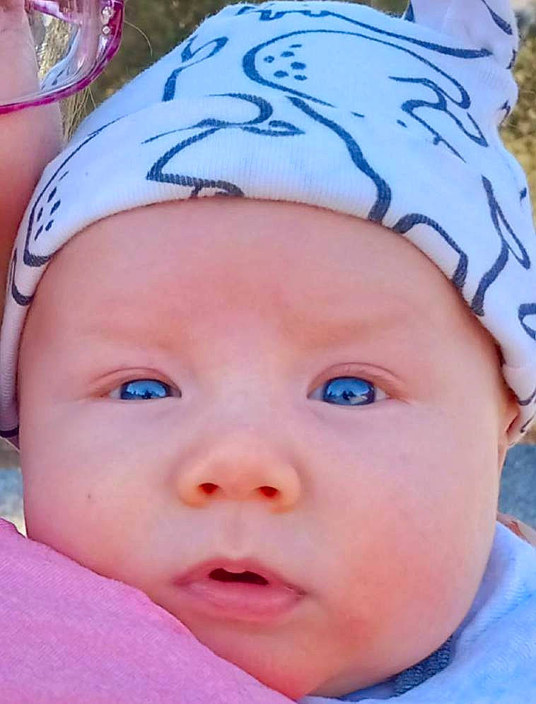 Finnley is registered to the contest to win money with this photo: baby, baby_toddler_clothing, cap, cheek, child, chin, close_up, cool, eye, eyebrow, eyelash, fun, happy, headgear, headwear, knit_cap, lip, nose, person, pink
