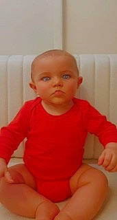 Maevy participe au concours pour gagner de l'argent avec cette photo : baby, baby_toddler_clothing, cheek, chest, child, chin, finger, flooring, knee, lip, mouth, neck, nose, person, shoulder, skin, sleeve, thigh, thumb, toddler