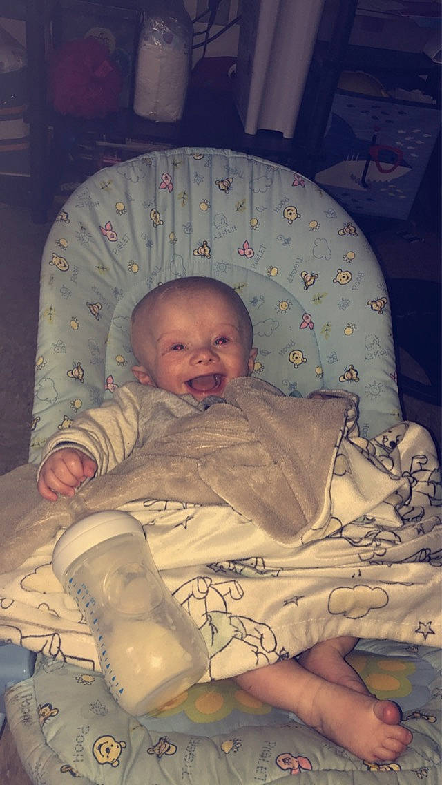 Jaxsyn joined the competition — help win amazing prizes! baby, baby_carriage, baby_products, baby_toddler_clothing, cheek, child, chin, comfort, eye, finger, human_body, iris, lap, mouth, nose, person, room, sitting, skin, thumb