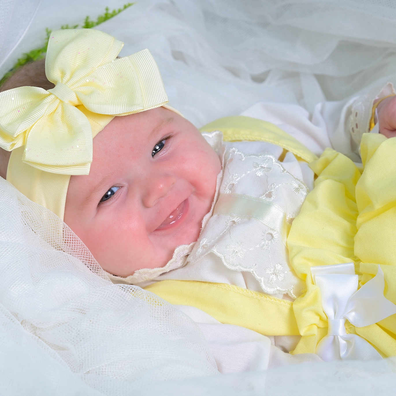 Ottillie-Rose is registered to the contest to win money with this photo: baby, bed, bodypart, bonnet, clothing, cradle, crib, face, finger, flower, flowerarrangement, furniture, hand, hat, head, infantbed, newborn, person, photography, portrait