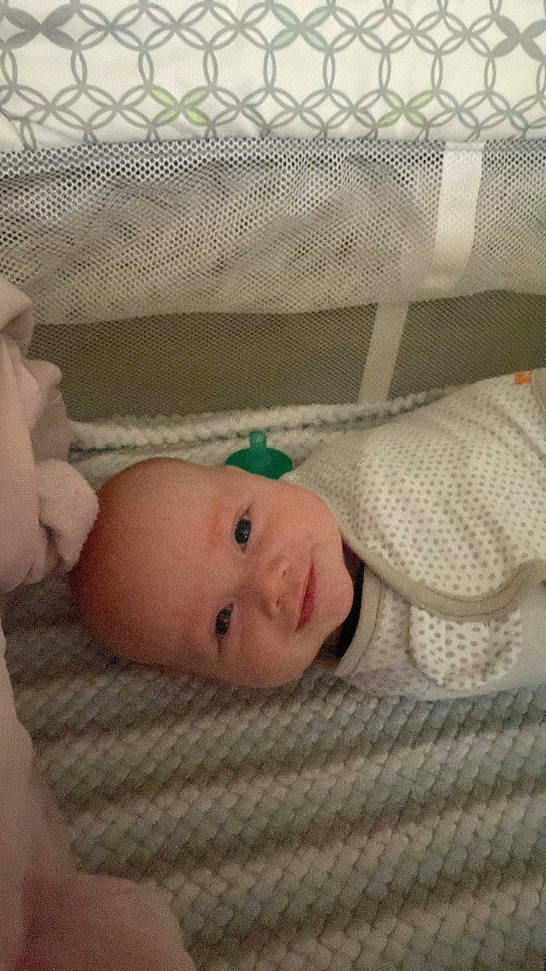 Carter is registered to the contest to win money with this photo: baby, baby_products, baby_safety, baby_sleeping, baby_toddler_clothing, bedding, bedtime, cheek, child, comfort, flooring, infant_bed, iris, linens, pattern, person, room, skin, textile, toddler