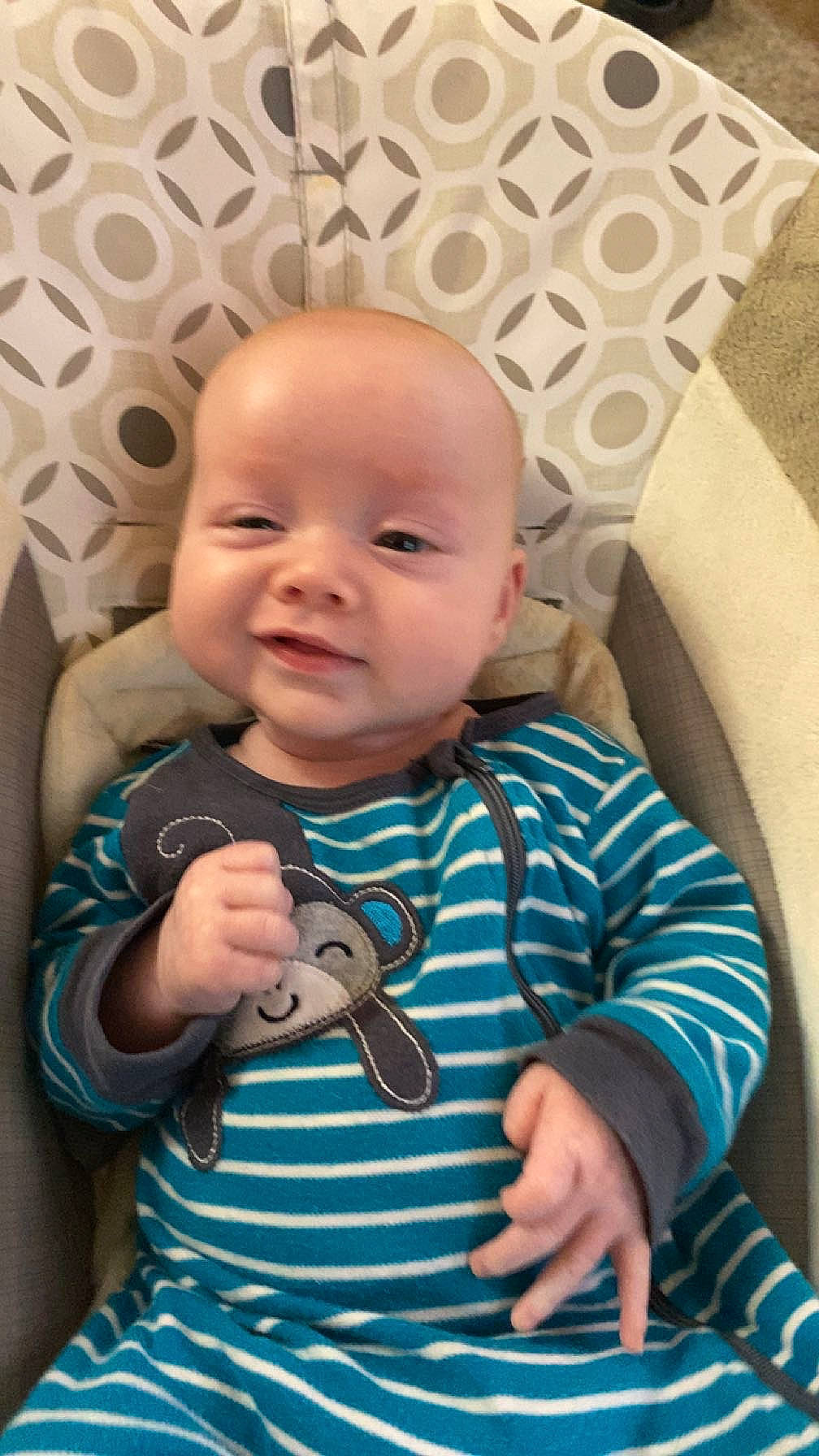 Carter is registered to the contest to win money with this photo: azure, baby, baby_toddler_clothing, cheek, chin, collar, comfort, eye, face, finger, happy, head, iris, nose, person, skin, sleeve, smile, t_shirt, textile