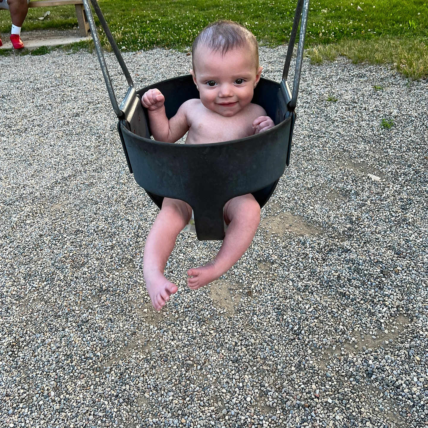 Andrew is registered to the contest to win money with this photo: baby, clothing, face, footwear, grass, head, nature, outdoorplayarea, outdoors, park, person, photography, plant, playarea, portrait, road, shoe, soil, toy, vegetation