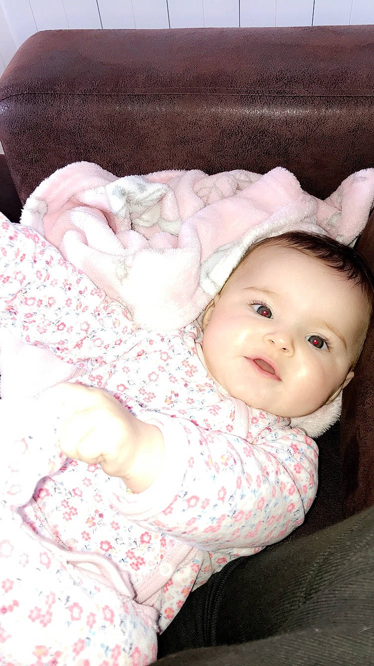 Apryl participe au concours pour gagner de l'argent avec cette photo : baby, beauty, cheek, child, eye, head, headgear, linens, lip, person, pink, skin, smile, textile, toddler