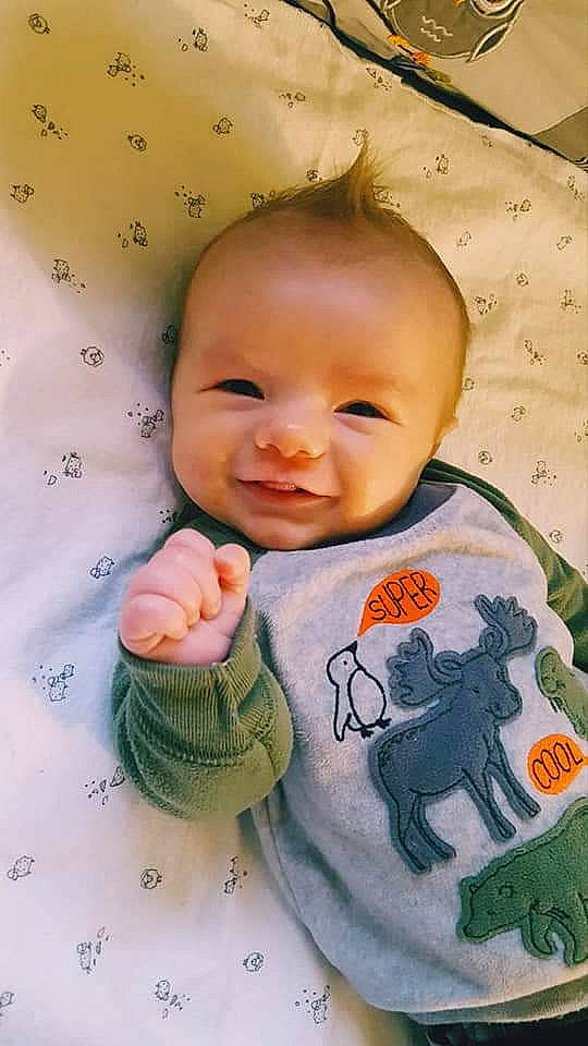 Cason is registered to the contest to win money with this photo: baby, baby_toddler_clothing, cheek, child, finger, forehead, gesture, hand, illustration, nose, person, product, skin, sleeve, smile, textile, thumb, toddler