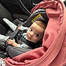 baby, car_seat, infant, child, blanket, car_interior, seatbelt, clothing, cute, person, transportation, safety, young_child, indoor, car, looking_up, pink_blanket, head, eyes, hands