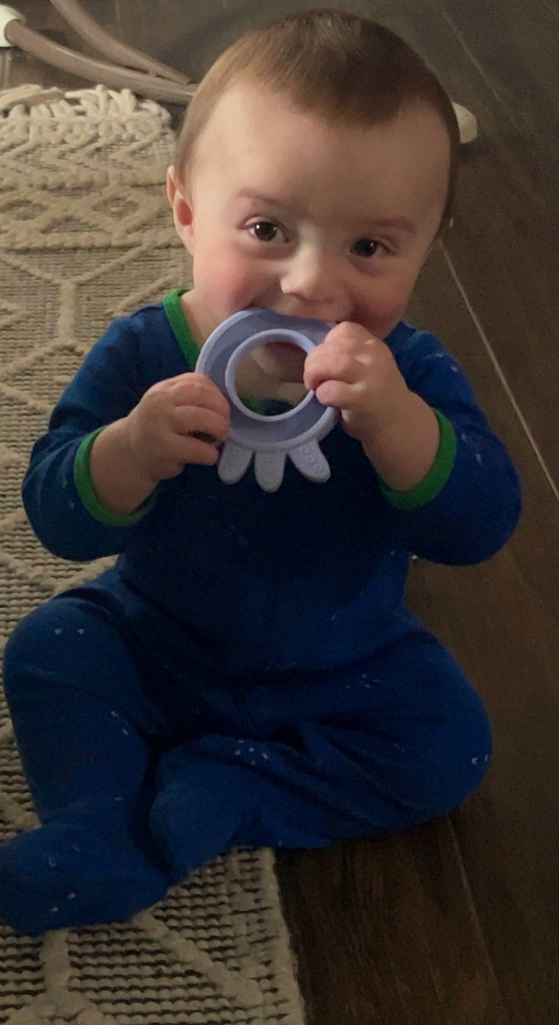 Atlas is registered to the contest to win money with this photo: baby, baby_toddler_clothing, child, drinkware, electric_blue, face, finger, fun, gesture, grass, hand, happy, person, play, sitting, sleeve, standing, t_shirt, thumb, toddler