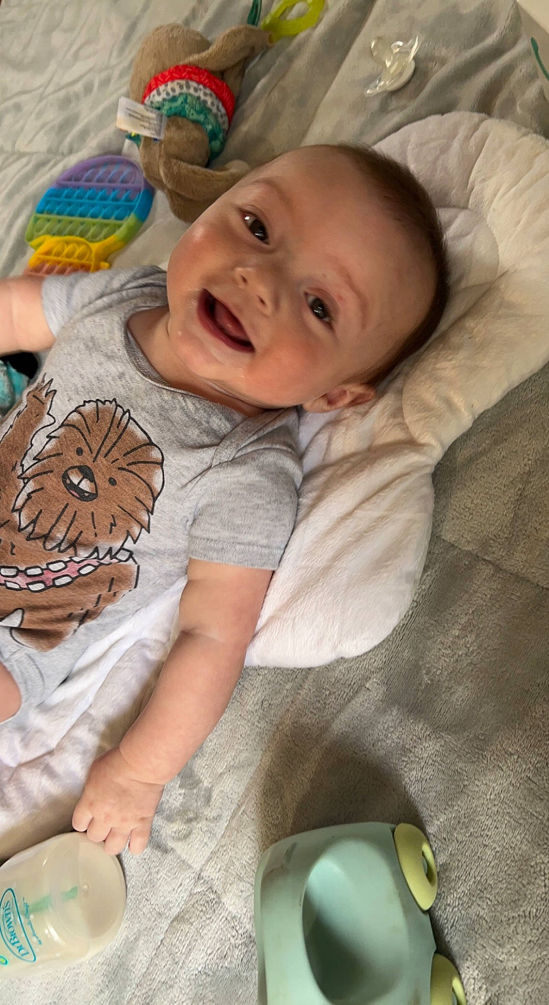 Atlas is registered to the contest to win money with this photo: baby, baby_products, baby_toddler_clothing, cheek, child, comfort, eye, green, happy, head, iris, linens, mouth, person, product, skin, sleeve, smile, textile, toddler