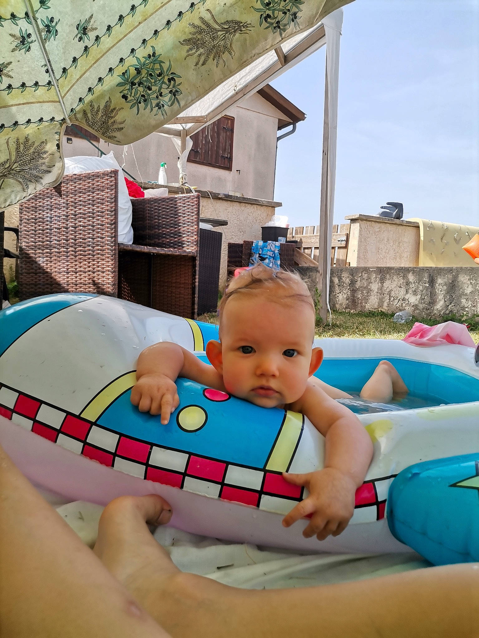 Kenzie a rejoint le concours — aidez-le/la à gagner de superbes lots ! baby, baby_products, bathing, chest, child, fun, games, happy, inflatable, leisure, outdoor_furniture, person, play, recreation, sitting, summer, swimming_pool, swimwear, thigh, toddler