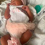 Kemyra joined the competition — help win amazing prizes! newborn, baby, sleeping, infant, portrait, pink, headband, flower, dress, skirt, frills, blanket, pacifier, hospital, indoor, lying_down, peaceful, cute, baby_girl, photography