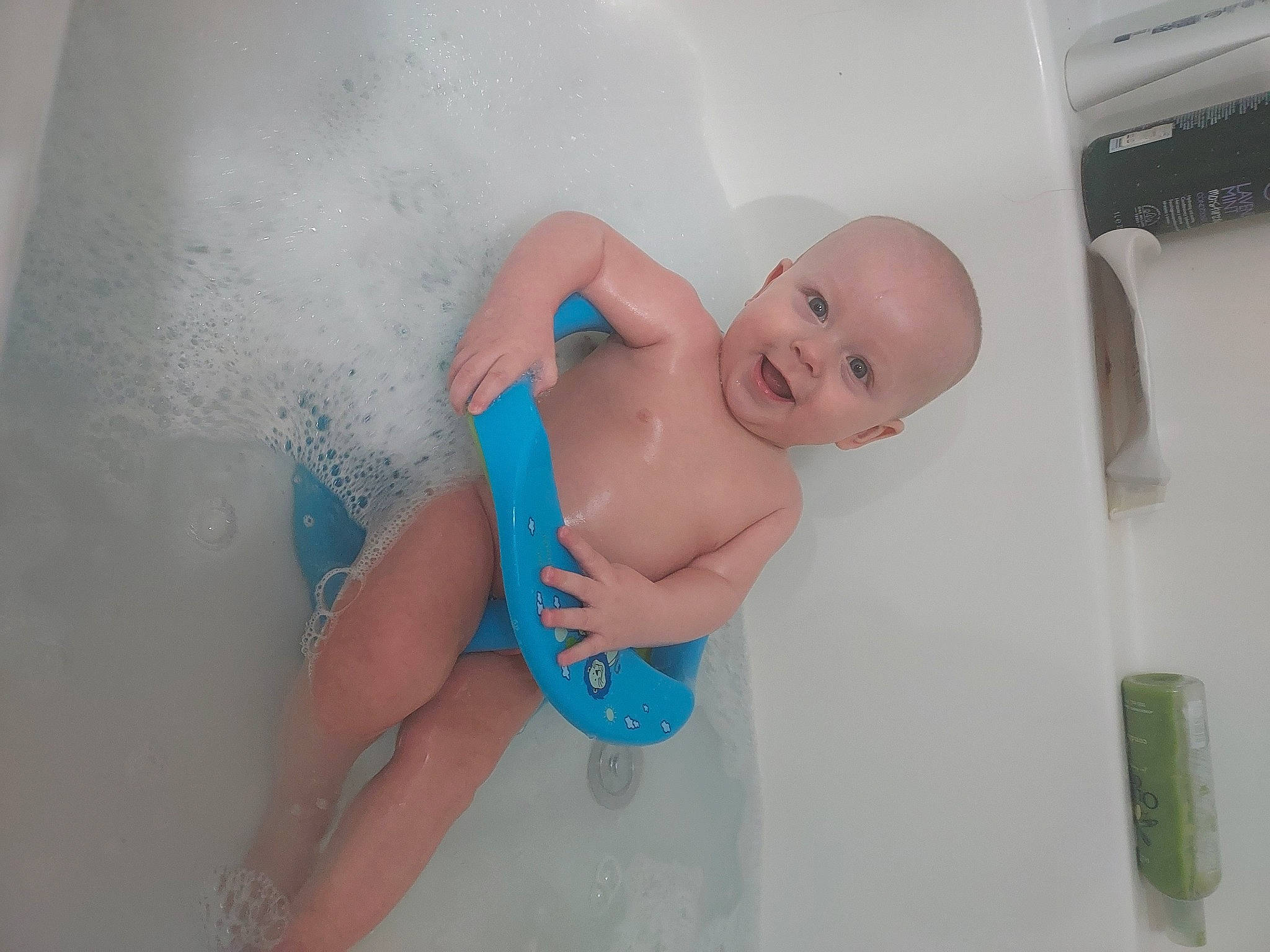 Westyn is registered to the contest to win money with this photo: abdomen, baby, bathing, cheek, chest, comfort, elbow, eye, finger, foot, fun, human_body, knee, mouth, person, skin, smile, stomach, thigh, toddler