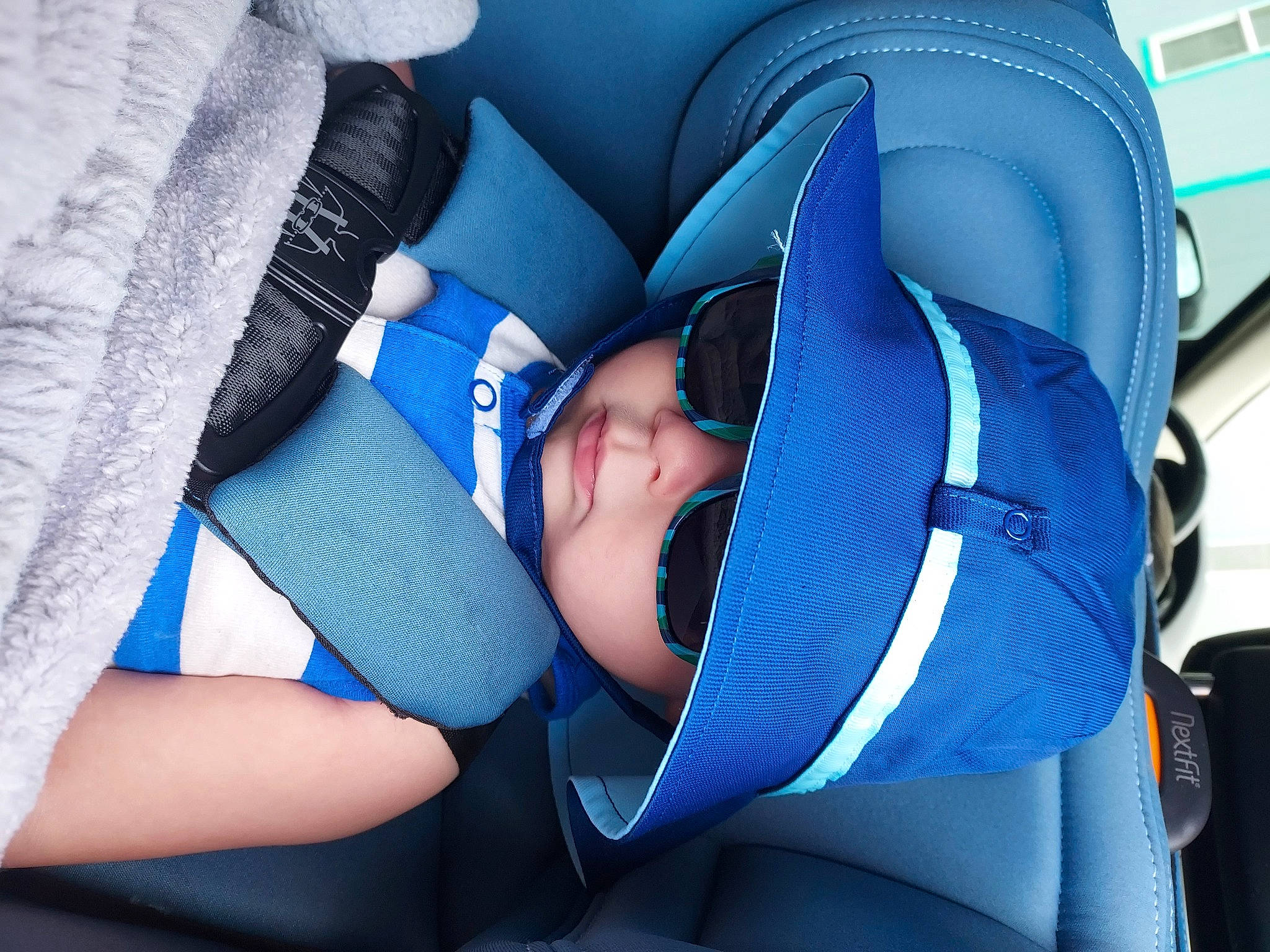 Westyn joined the competition — help win amazing prizes! auto_part, automotive_design, azure, baby, baby_toddler_clothing, car_seat, carmine, comfort, electric_blue, face, finger, hat, human_leg, person, personal_protective_equipment, product, purple, textile, thigh, toddler