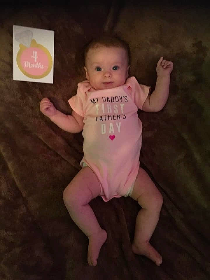 Johnnie is registered to the contest to win money with this photo: arm, baby, baby_products, baby_toddler_clothing, cheek, child, finger, fun, hand, head, joint, leg, person, pink, product, sitting, skin, sleeve, toddler