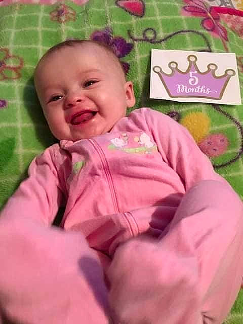 Johnnie is registered to the contest to win money with this photo: baby, baby_products, cheek, child, nap_mat, nose, person, pink, play, product, skin, smile, toddler