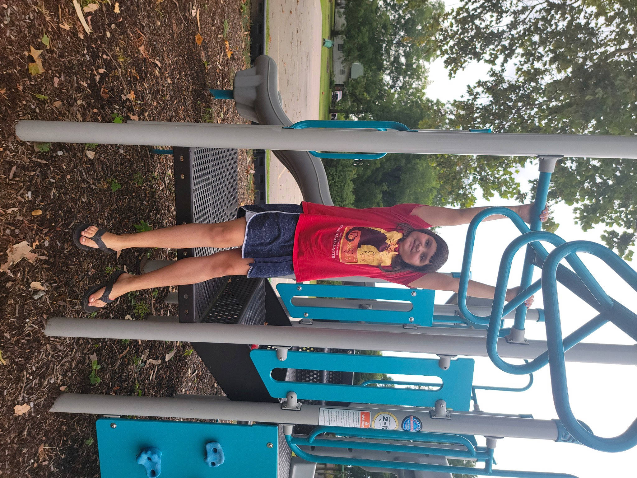 Kendra-rose is registered to the contest to win money with this photo: arm, balance, clothing, dress, elbow, electric_blue, fun, hat, human_leg, joy, leg, leisure, line, person, recreation, shorts, t_shirt, thigh, tree, vehicle