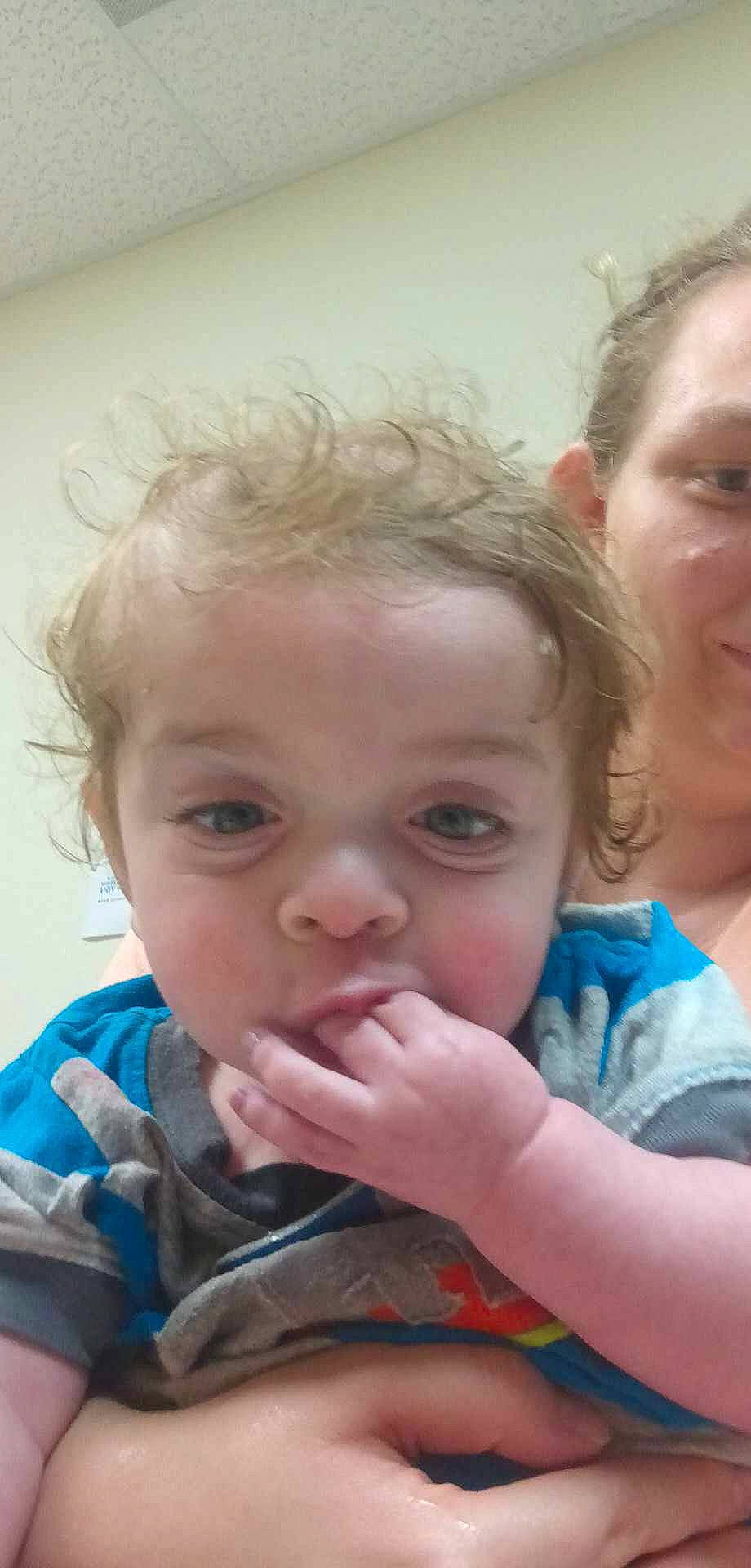 Kaden is registered to the contest to win money with this photo: arm, cheek, chin, ear, eye, eyelash, face, finger, gesture, hair, hand, happy, head, iris, lip, mouth, nose, organ, person, skin