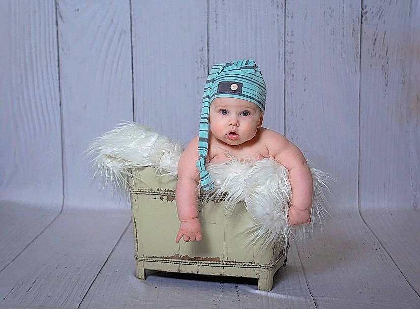 Kysen joined the competition — help win amazing prizes! baby, beanie, box, bridal_accessory, cap, child, fashion_accessory, fashion_design, feather, flash_photography, flooring, fun, fur, happy, headband, headpiece, headwear, jewellery, person, sitting