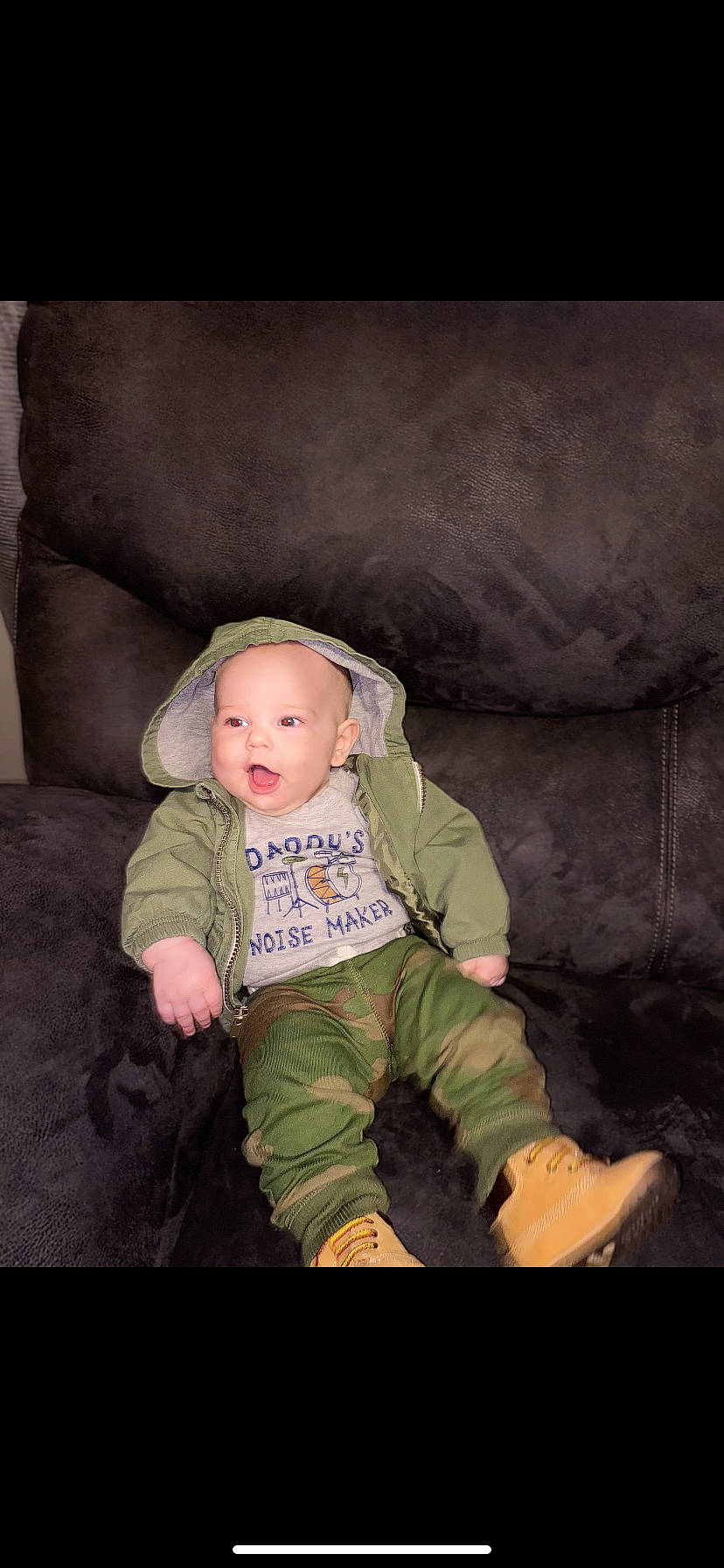 Kysen is registered to the contest to win money with this photo: baby, baby_toddler_clothing, cheek, child, comfort, darkness, flash_photography, flooring, fun, grass, leg, outerwear, person, personal_protective_equipment, room, sitting, sleeve, t_shirt, tints_and_shades, toddler