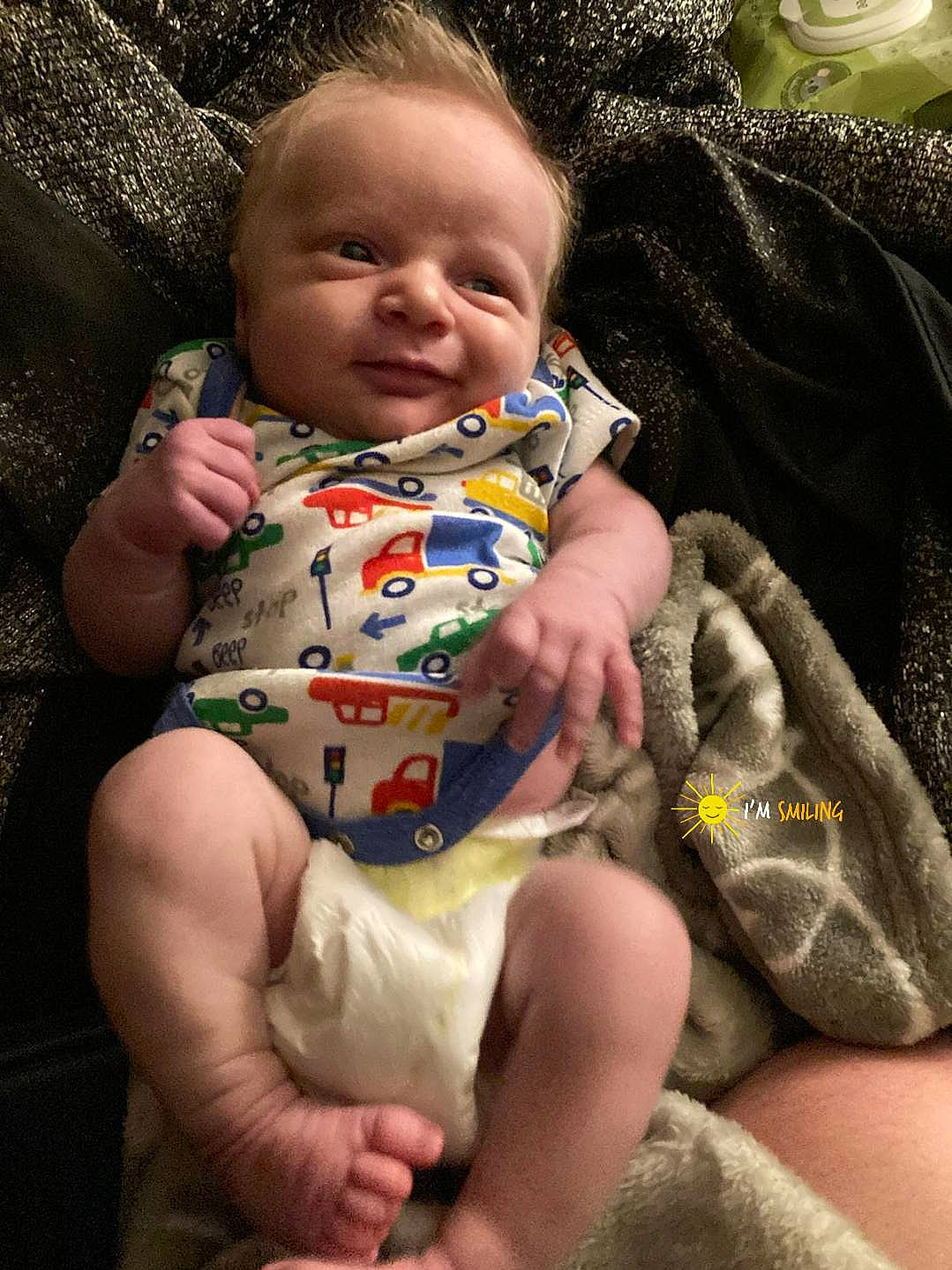 Atlas joined the competition — help win amazing prizes! baby, baby_toddler_clothing, cheek, child, comfort, face, finger, fun, happy, head, human_body, lap, linens, lip, mouth, person, sitting, skin, textile, thigh