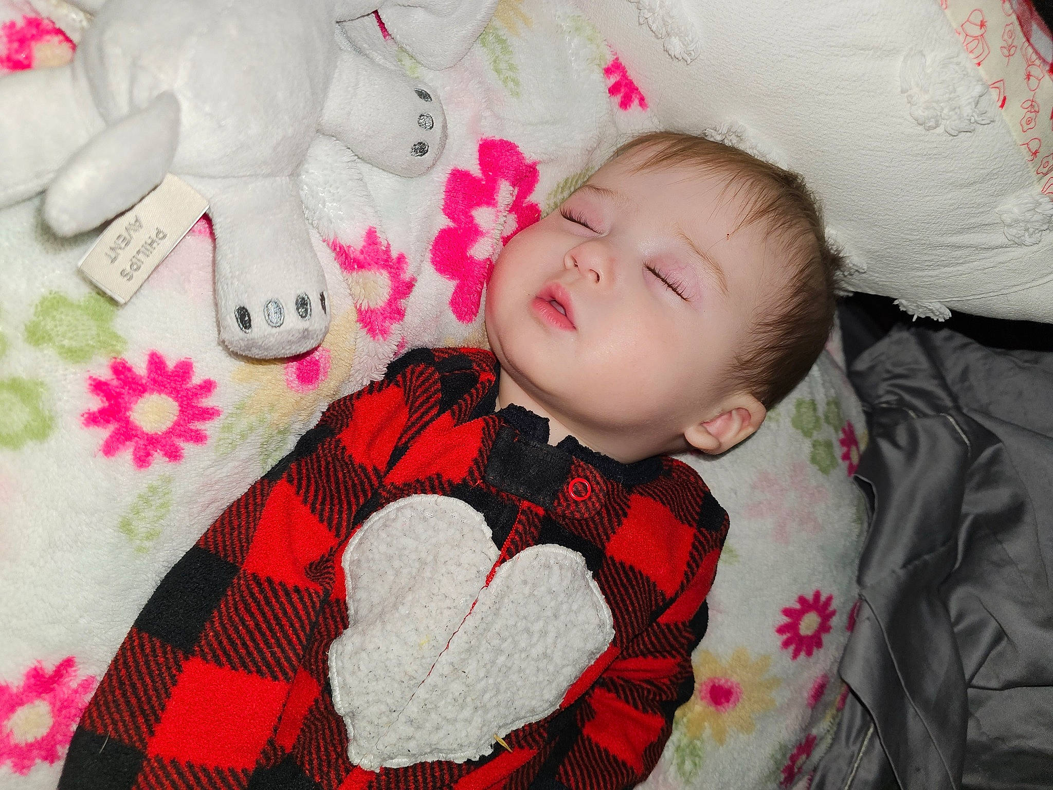 Hannah joined the competition — help win amazing prizes! baby, baby_toddler_clothing, cheek, comfort, eye, face, head, linens, lip, mammal, pattern, person, pink, plaid, red, skin, sleeve, tartan, textile, toddler