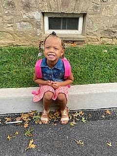 Sevyn joined the competition — help win amazing prizes! asphalt, child, foot, fun, garden, gesture, grass, happy, human_leg, joy, leisure, people_in_nature, person, plant, road_surface, sidewalk, sitting, smile, soil, toddler