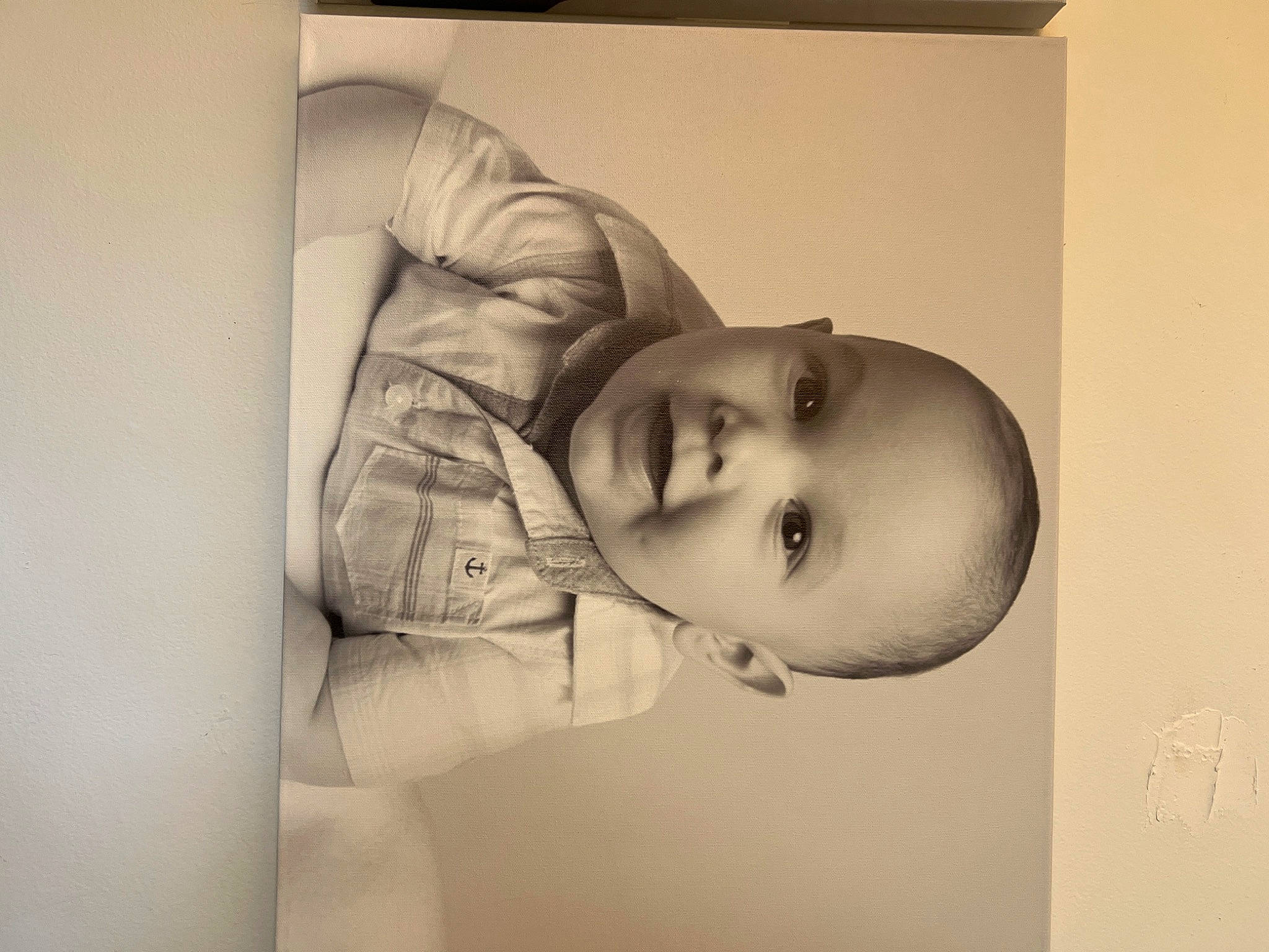 Austin is registered to the contest to win money with this photo: art, baby, child, comfort, elbow, eyebrow, eyelash, flash_photography, gesture, happy, iris, jaw, monochrome, monochrome_photography, nose, person, room, sculpture, toddler, vintage_clothing