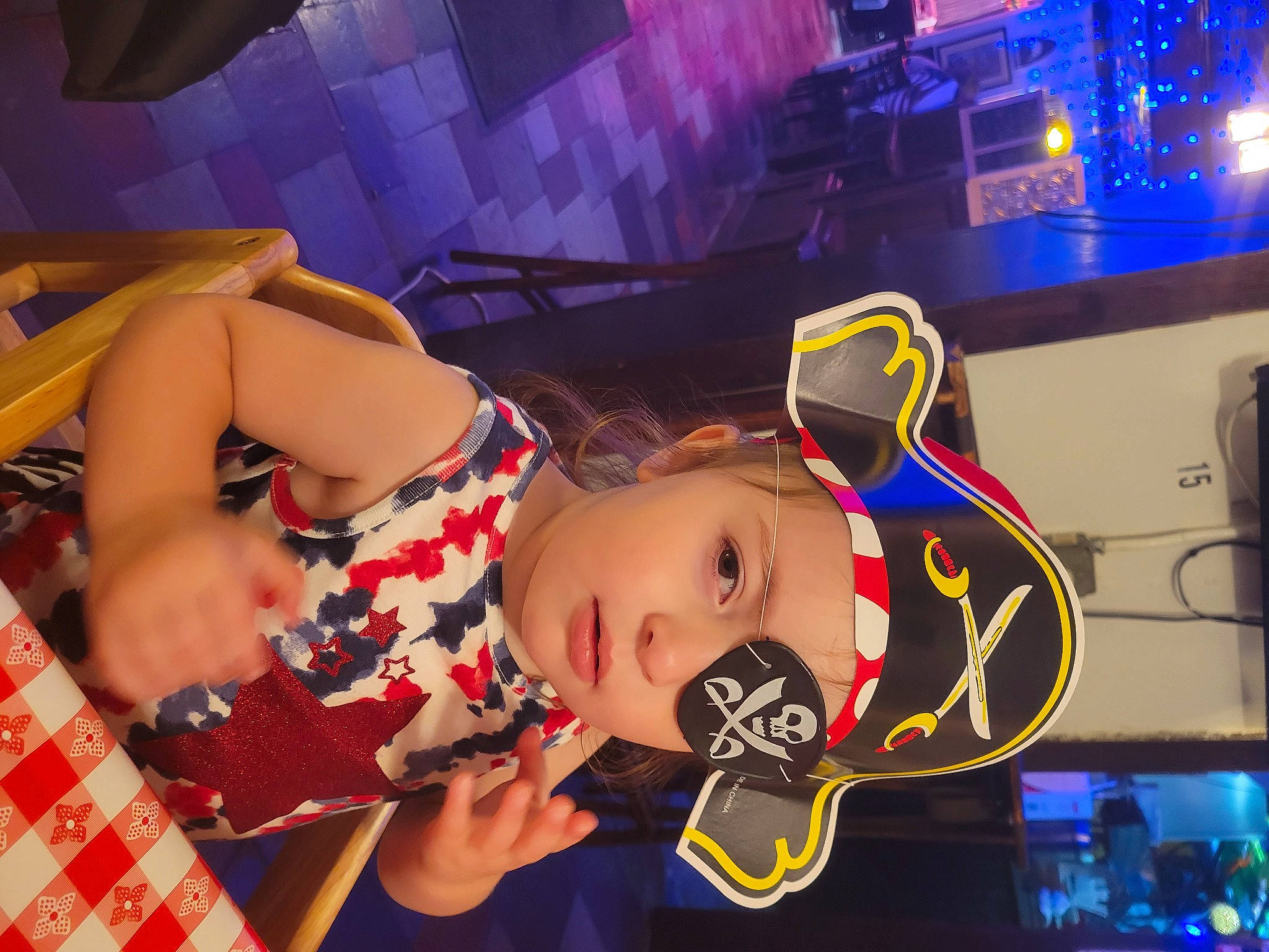 Destiny is registered to the contest to win money with this photo: animation, art, audio_equipment, child, entertainment, event, eyewear, fashion_design, fun, games, headwear, leisure, pattern, performance, person, plaid, recreation, room, tartan, thigh