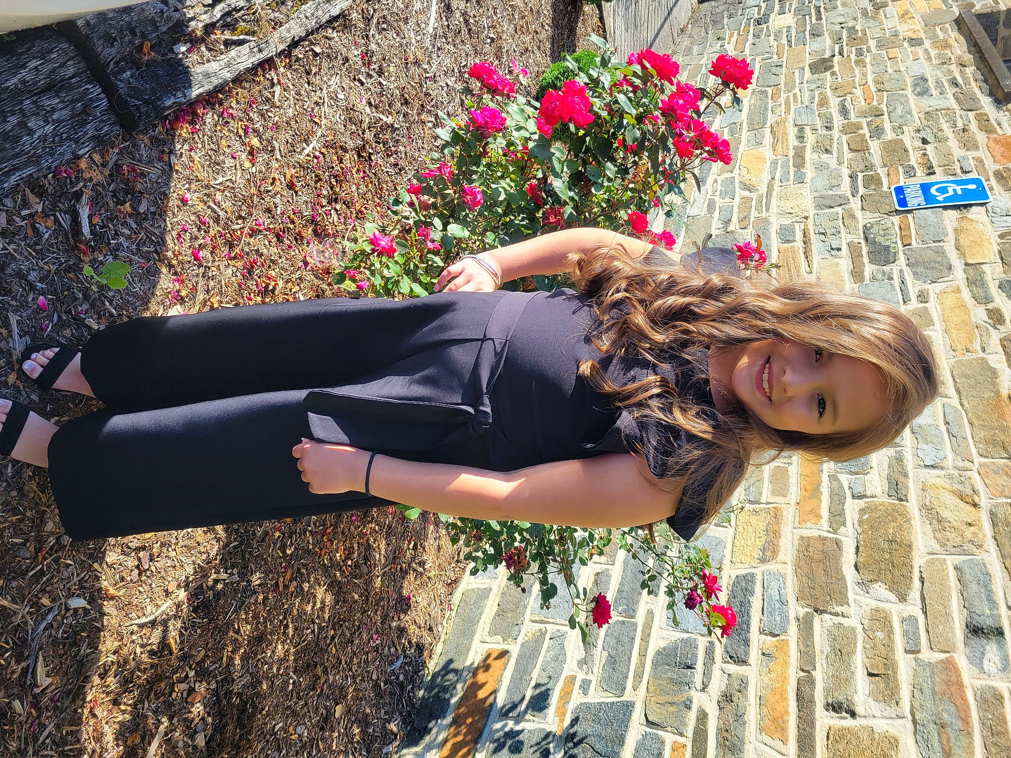 Tori is registered to the contest to win money with this photo: beauty, clothing, eyewear, flower, grass, hair, happy, human_leg, joy, knee, leaf, leisure, long_hair, people_in_nature, person, pink, plant, smile, street_fashion, textile