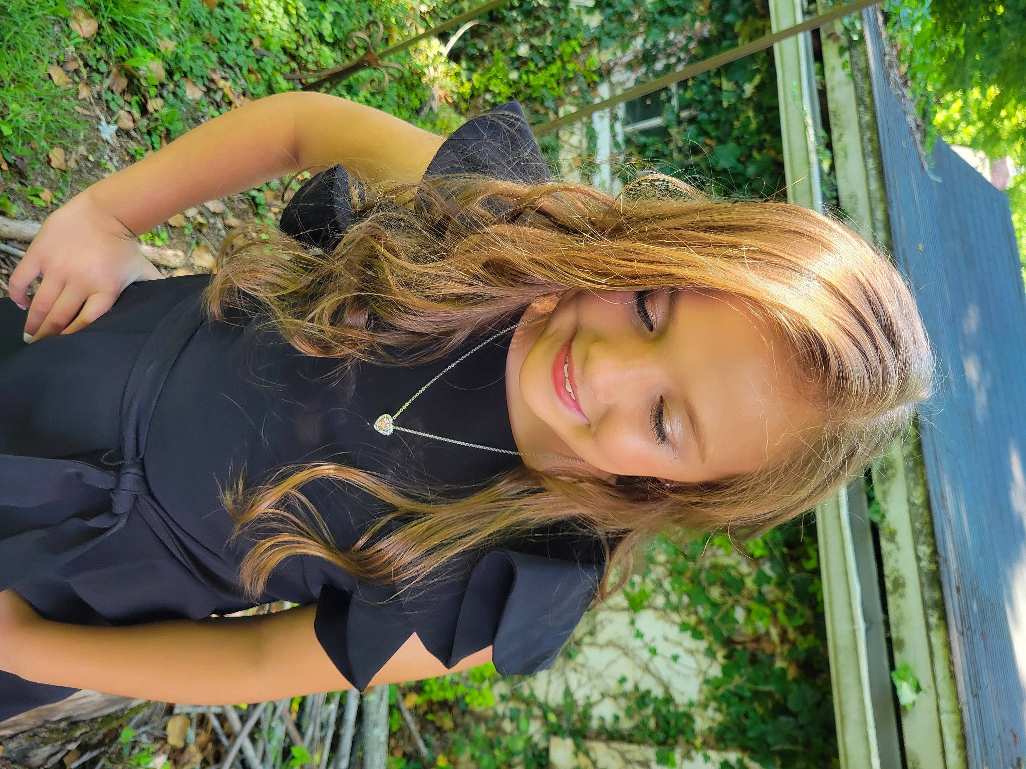 Tori is registered to the contest to win money with this photo: beauty, blond, brown_hair, cool, elbow, fun, grass, happy, joy, leisure, long_hair, people_in_nature, person, plant, recreation, shoulder, sitting, smile, street_fashion, thigh