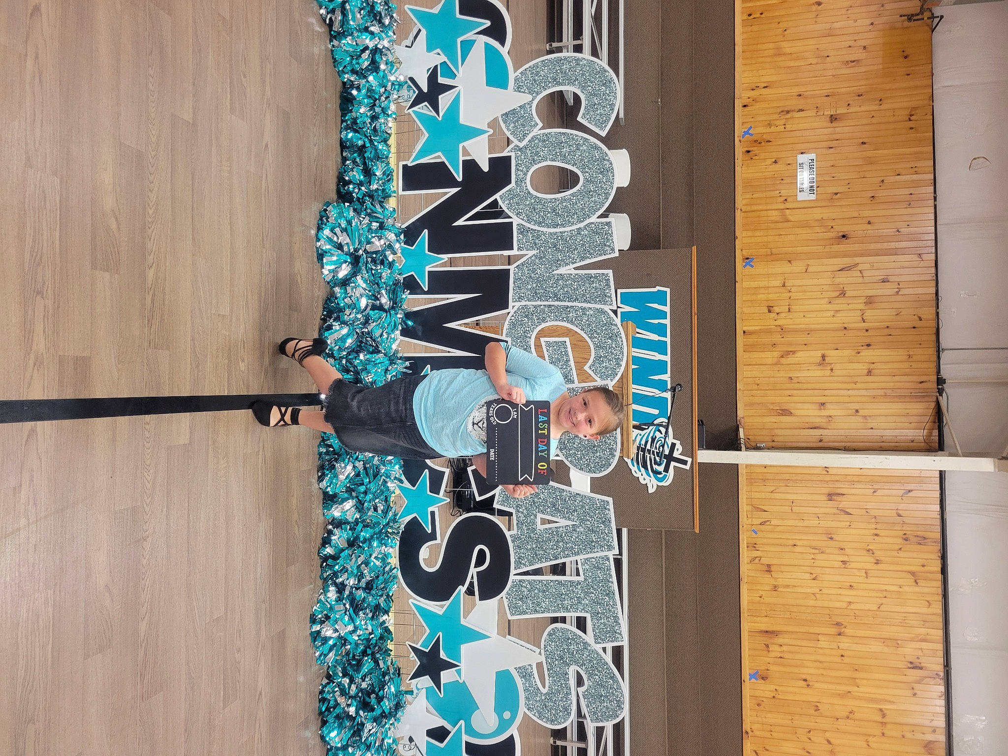 Tori is registered to the contest to win money with this photo: art, electric_blue, flooring, font, glass, hardwood, joy, metal, number, pattern, person, plank, plywood, rectangle, room, symmetry, tints_and_shades, varnish, visual_arts, wood