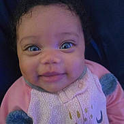 Ka'Leiya joined the competition — help win amazing prizes! adorable, apparel, baby, baby_girl, blue_eyes, child, closeup, cozy, curly_hair, cute, face, happy, indoor, infant, person, pink_clothing, portrait, smile, soft_texture, young_child