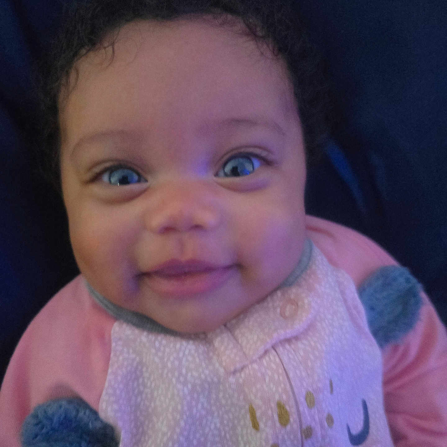 Ka'Leiya joined the competition — help win amazing prizes! adorable, apparel, baby, baby_girl, blue_eyes, child, closeup, cozy, curly_hair, cute, face, happy, indoor, infant, person, pink_clothing, portrait, smile, soft_texture, young_child