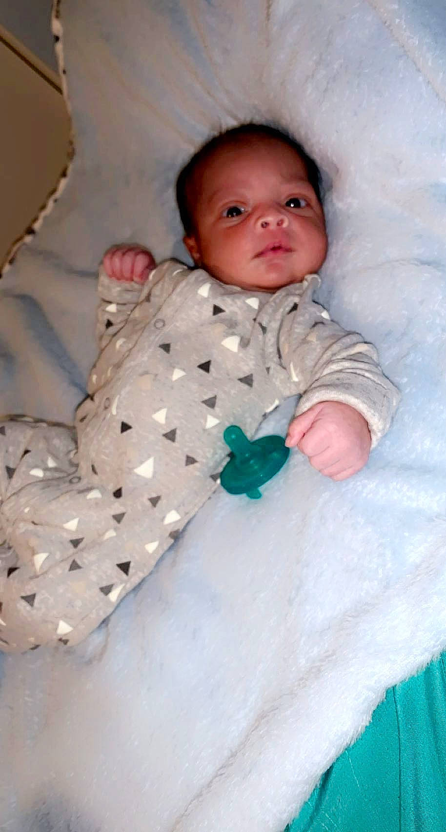 Kendrick joined the competition — help win amazing prizes! baby, baby_safety, baby_toddler_clothing, bedding, cheek, child, comfort, eye, face, head, linens, pattern, person, pink, product, room, sitting, skin, sleeve, textile