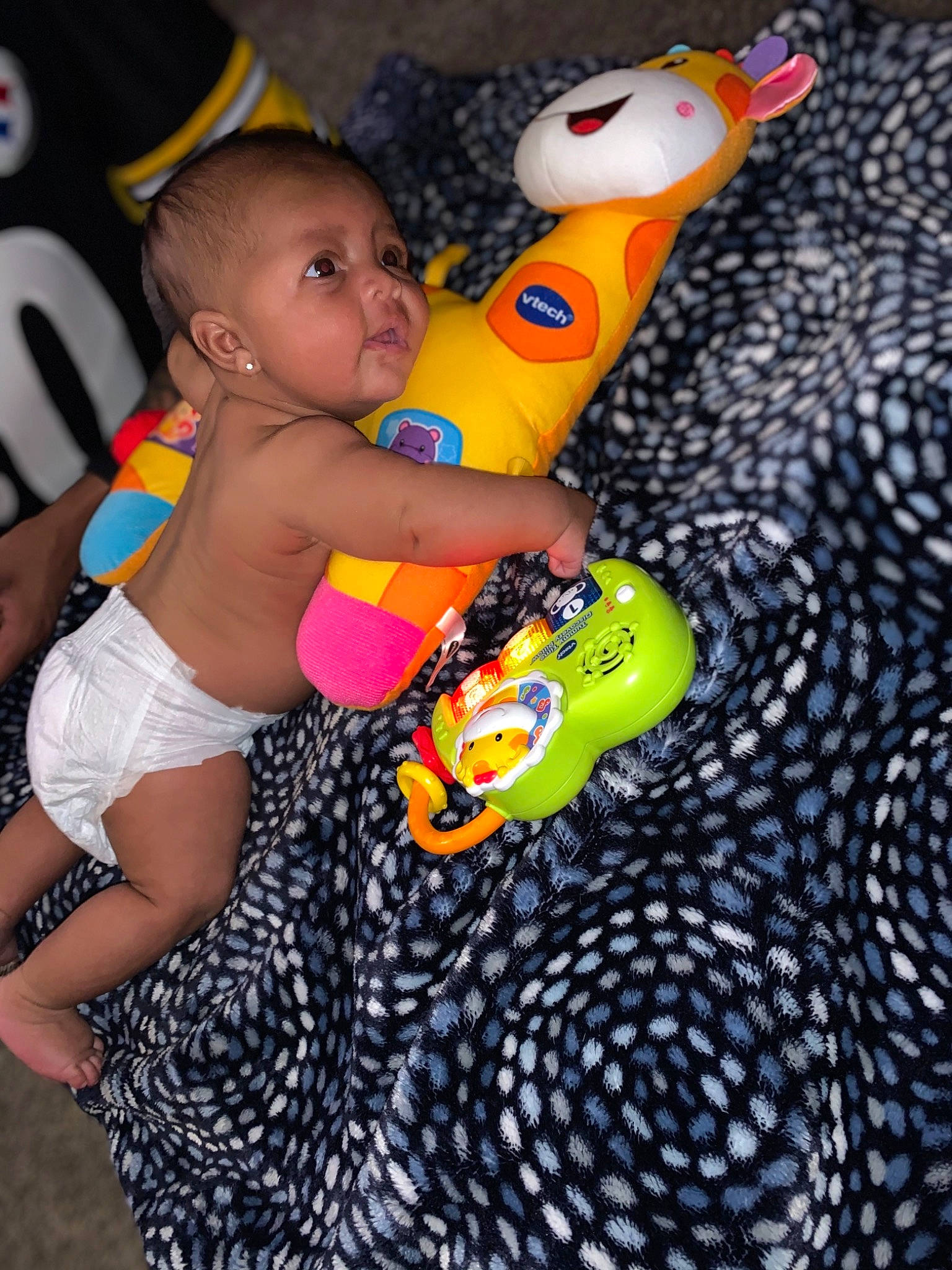 Kendrick joined the competition — help win amazing prizes! abdomen, baby, baby_products, baby_toddler_clothing, baby_toys, child, fun, happy, human_leg, leisure, nail, pattern, person, play, recreation, stuffed_toy, thigh, toddler, toy, toy_vehicle
