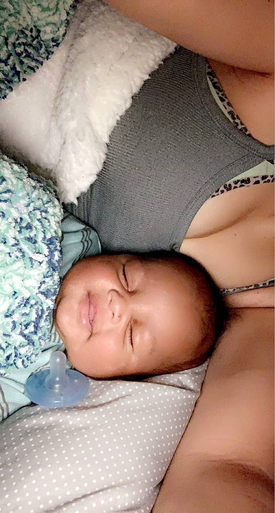 Kendrick is registered to the contest to win money with this photo: abdomen, arm, baby, baby_sleeping, brassiere, chest, comfort, elbow, eyebrow, eyelash, hand, human_body, human_leg, leg, linens, mouth, person, skin, thigh, toddler