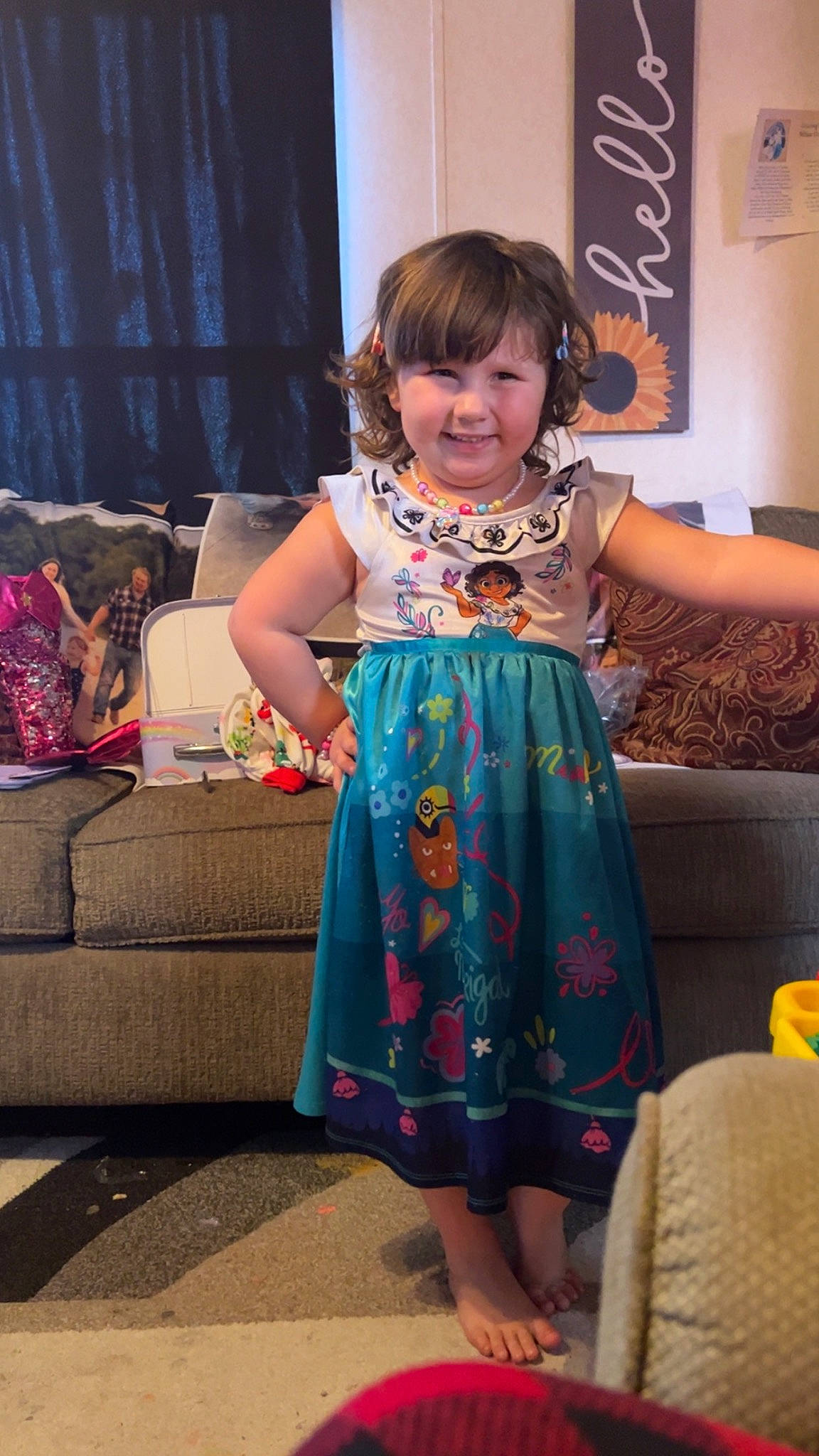 Melissa Phipps is registered to the contest to win money with this photo: baby_toddler_clothing, child, costume, curtain, day_dress, dress, event, fashion_design, formal_wear, fun, happy, human_leg, joy, magenta, pattern, person, pink, purple, room, sitting