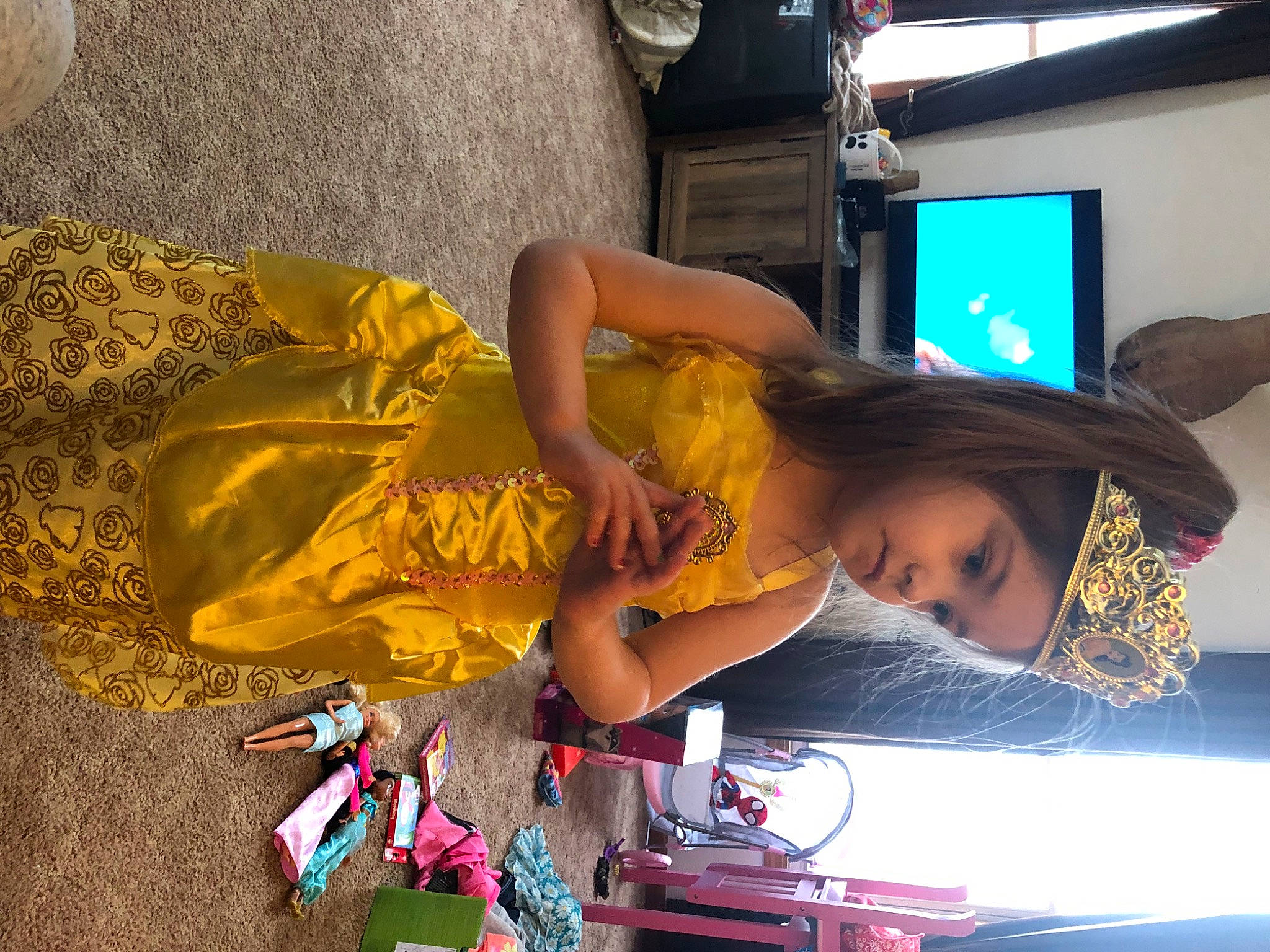 Annabelle is registered to the contest to win money with this photo: art, child, cool, costume, event, fashion_accessory, fashion_design, flooring, fun, hat, headwear, human_leg, person, play, room, television, toddler, visual_arts