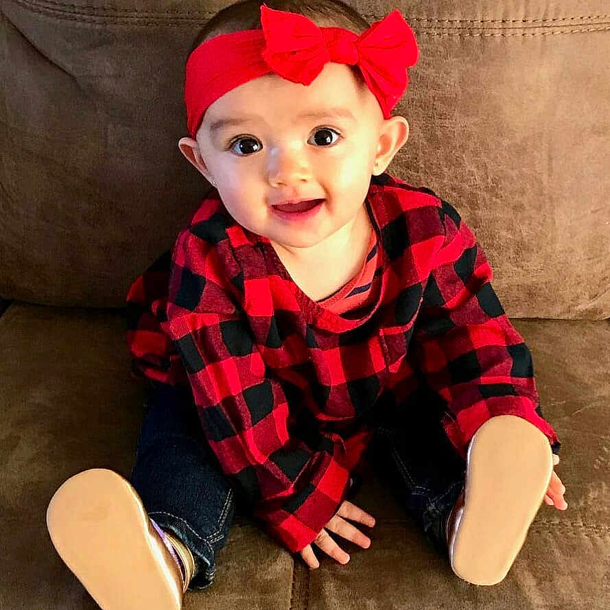 Mavis is registered to the contest to win money with this photo: child, child_model, design, hair_accessory, hat, headgear, pattern, person, plaid, product, red, tartan, toddler